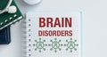 A notebook with the words Brain Disorders written on it Royalty Free Stock Photo