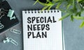 A notebook with the words Special Needs Plan written on it. Royalty Free Stock Photo