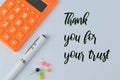 Notebook written with THANK YOU FOR YOUR TRUST Royalty Free Stock Photo