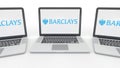 Notebooks with Barclays logo on the screen. Computer technology conceptual editorial 3D rendering