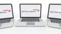 Notebooks with British Airways logo on the screen. Computer technology conceptual editorial 3D rendering