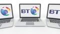 Notebooks with BT Group logo on the screen. Computer technology conceptual editorial 3D rendering