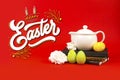 Notebooks, Easter eggs and white tea pot on a red background Royalty Free Stock Photo