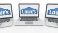 Notebooks with Lowe`s logo on the screen. Computer technology conceptual editorial 3D rendering