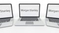 Notebooks with Morgan Stanley Inc. logo on the screen. Computer technology conceptual editorial 3D rendering