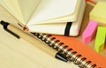 Notebooks, pen and stickers Royalty Free Stock Photo