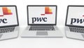 Notebooks with PricewaterhouseCoopers PwC logo on the screen. Computer technology conceptual editorial 3D rendering