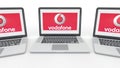 Notebooks with Vodafone logo on the screen. Computer technology conceptual editorial 3D rendering