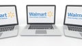 Notebooks with Walmart logo on the screen. Computer technology conceptual editorial 3D rendering