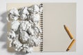 Notepad and crumpled paper balls Royalty Free Stock Photo