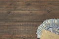 Notepad With Dollar Cash On The Brown Wood Background Royalty Free Stock Photo