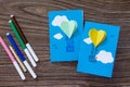 Notepad for entries of handmade balloons and markers decorated with appliquÃÂ©s, paper on a desk, craft of paper.