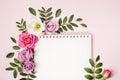 Notepad and flower border pattern on pink background. Happy Holiday concept, floral boho style