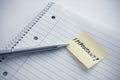 Notepad with an important note Royalty Free Stock Photo