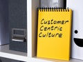 Notepad with an inscription Customer centric culture is on the shelf. Royalty Free Stock Photo