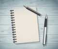 Notepad objects wood background flat design pen and pencil write