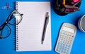 Notepad with office supplies Royalty Free Stock Photo