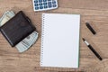 notepad with pen, calculator, dollar bills Royalty Free Stock Photo