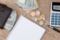 Notepad with pen, calculator, dollar bills Royalty Free Stock Photo