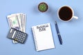 Notepad with pen, coffee, dollars, calculator and cactus on a blue background. Copy the space. Top view. Financial, marketing, bus Royalty Free Stock Photo