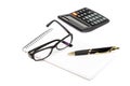 Notepad, pen, glasses, calculator isolated on white background Royalty Free Stock Photo