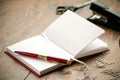 Notepad, pen, staples, stapler and scissors on the table Royalty Free Stock Photo