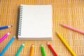 Notepad with pencil on wood board background. using wallpaper or background for education, business photo. Take note of the produc Royalty Free Stock Photo