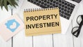 Notepad with PROPERTY INVESTMEN text Royalty Free Stock Photo