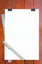 Notepad, ruler and pen on desk