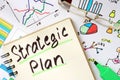 Notepad with sign strategic plan. Royalty Free Stock Photo