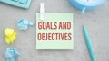 text Goals and Objectives on wooden deskt. Business and finance concept Royalty Free Stock Photo