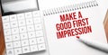 Notepad with text Make a good first impression on wooden background with calculator and red marker Royalty Free Stock Photo