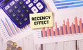 Notepad with the text Recency effect and the graph on desk. Memory and position relationship, psychology concept