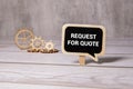 Notepad and text REQUEST FOR QUOTE. Royalty Free Stock Photo