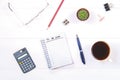 Notepad with text: To do list. White table with calculator, cactus, note paper, coffee mug, pen, glasses. Royalty Free Stock Photo