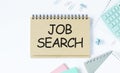 Notepad with words job search concept Royalty Free Stock Photo
