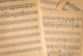 Notes on paper. Old music sheet. Melody on page. Notes and lines. Music concept. Rhythm on vintage blank. Sound symbols and signs Royalty Free Stock Photo