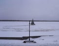 Noth Russia, bench and street lamp Tugboat Breaking Floating Ice in Frozen River