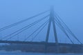 Nothern Moscow Bridge in thick fog. The concept of foggy weather in the city. Kyiv, Ukraine
