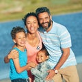 Nothing beats beach vacations. a family of four enjoying a day at the beach.