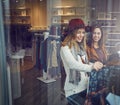 Nothing beats a girls day out. two best friends out shopping in a clothing store. Royalty Free Stock Photo