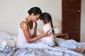 Nothing comes close to you in this world. a beautiful young mother bonding with her little girl in bed at home. Royalty Free Stock Photo