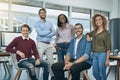 Nothing grows a business like a go getter team. Portrait of a team of young go getters working in a modern office. Royalty Free Stock Photo
