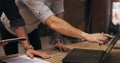 Nothing is impossible when we put our heads together. two men discussing something on a laptop while standing together Royalty Free Stock Photo