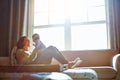 Nothing quite like a mothers love. a young woman bonding with her baby boy on the sofa at home. Royalty Free Stock Photo