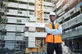 Nothing is too big for our company to build. Portrait of a confident young man working at a construction site. Royalty Free Stock Photo