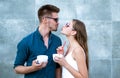 Nothing but very two hot beverages between you. Woman and man have latter drink. Couple in love drink coffee outdoor Royalty Free Stock Photo