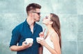 Nothing but very two hot beverages between you. Woman and man have latter drink. Couple in love drink coffee outdoor Royalty Free Stock Photo