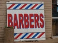 A Modern Version of the Old Barber Pole Sign Works Just Fine