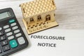 Notice of foreclosure of a house. Concept of eviction for non-payment of a mortgage to the bank. Rising interest rates. House and